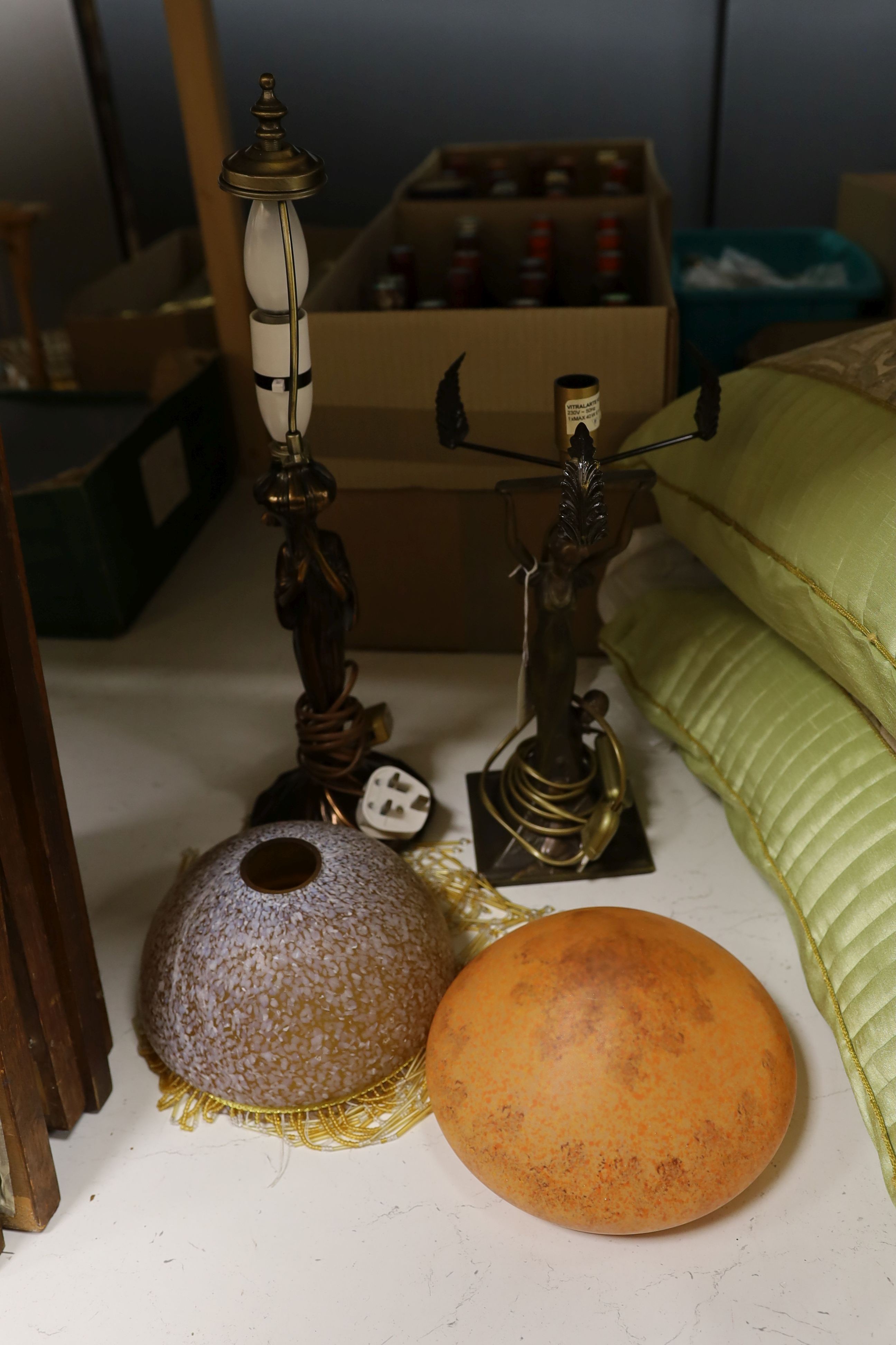 A pair of metal figural table lamps